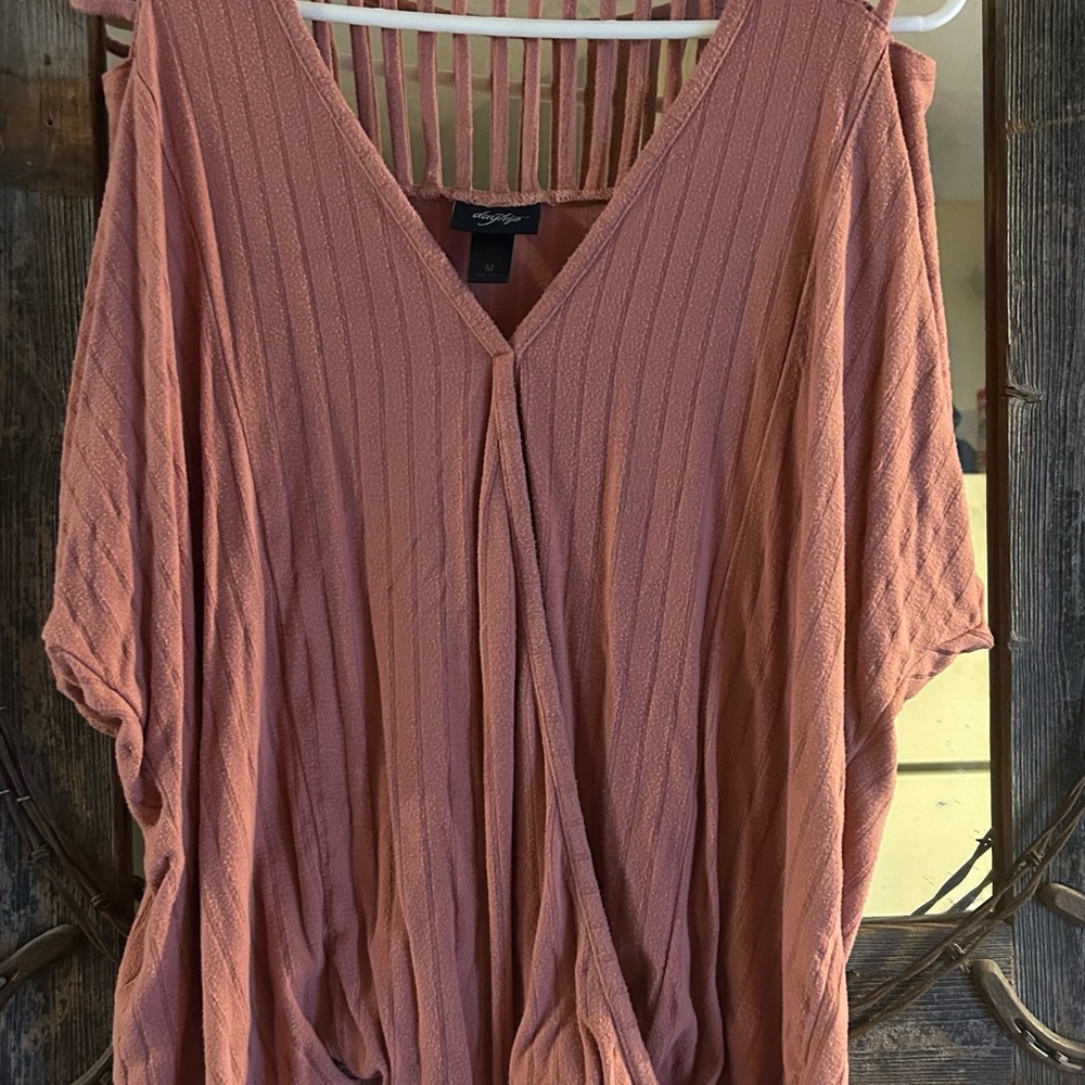 Daytrip Buckle cold shoulder top.  Coral colored wore 1 time very soft